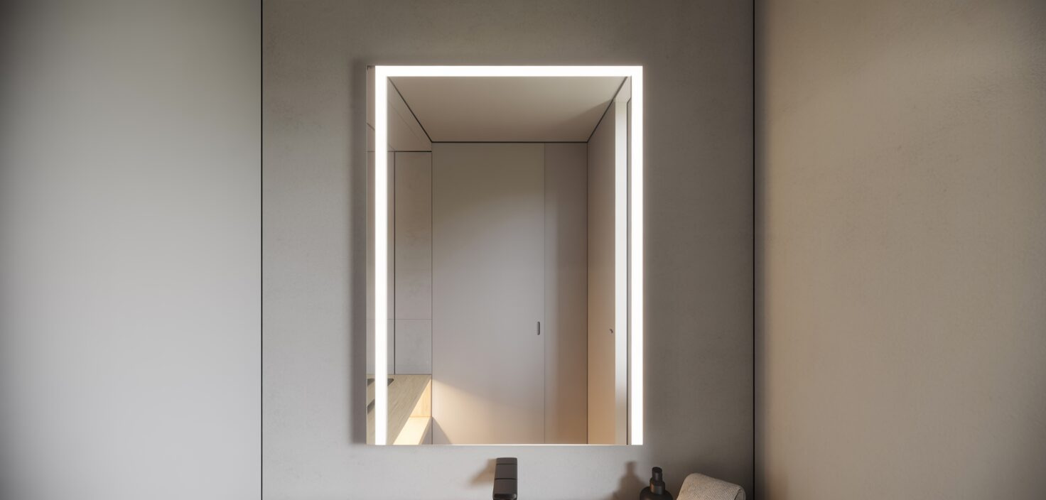 Minimalist badrum med spegel och integrerad belysning