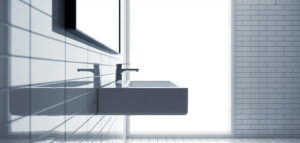 Fotorealistiskt foto av minimalistiskt badrum med handfat och kakel.